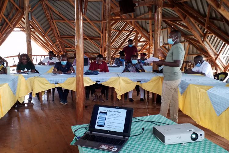 DCP team training local enumerators on data collection using mobile phones and ODK